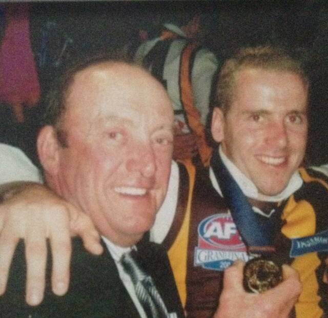 BEST MATES: Barry and Rick Ladson after Hawthorn's 2008 grand final win over Geelong. Rick kicked the match-sealing goal. Barry died the following year.