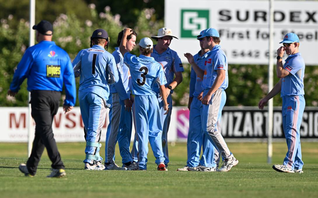 Strathdale-Maristians celebrates a wicket. Picture by Enzo Tomasiello