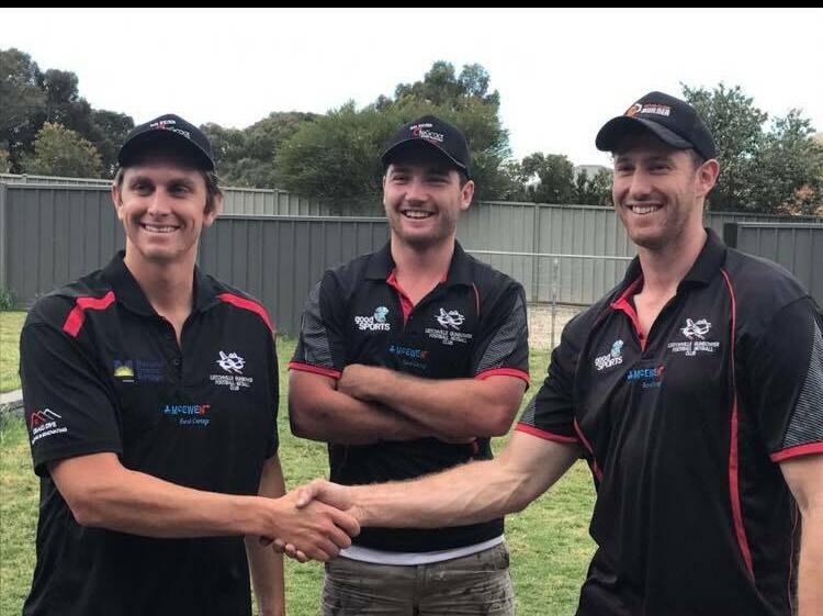 SIGNING ON: Leitchville-Gunbower Tasmanian recruits Russell De Groot and Jack Gleeson with new coach Michael Pilcher. De Groot and Gleeson join the Bombers after the club won this year's Heathcote District league grand final against North Bendigo. Picture: CONTRIBUTED