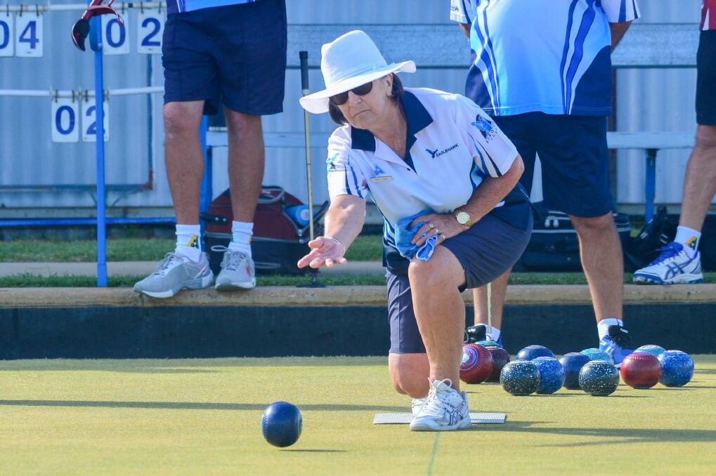 ON A ROLL: Eaglehawk's Bev Haw bowls against White Hills on Monday. The Hawks won 69-61 at home and have moved to the top of the ladder.