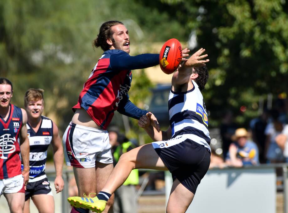 TOP GAME: Sandhurst ruckman Chris Down wins a tap-out. Down was a standout in the Dragons' come-from-behind victory.