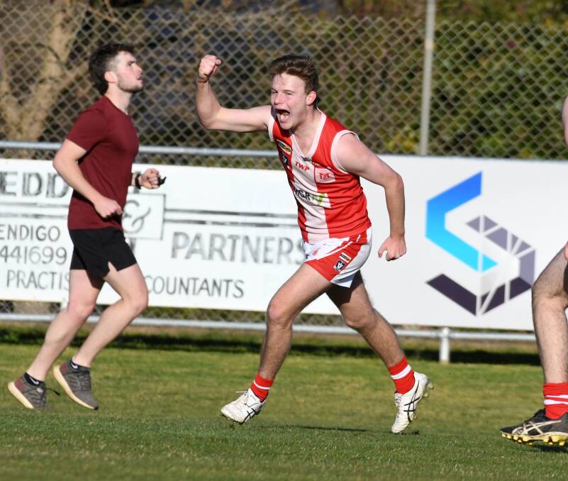 UP AND ABOUT: South Bendigo's Declan McMahon celebrates one of his four goals against Eaglehawk at Canterbury Park on Saturday in round one of the BFNL's under-18 competition. PICTURES: NONI HYETT