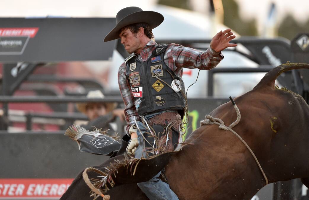 BIG NIGHT: Fraser Babbington aboard Bad Apple in the opening round of Saturday night's PBR Australia Bendigo Invitational. Babbington was crowned champion after completing four successful rides and producing the two highest scores of 87.0. Picture: GLENN DANIELS