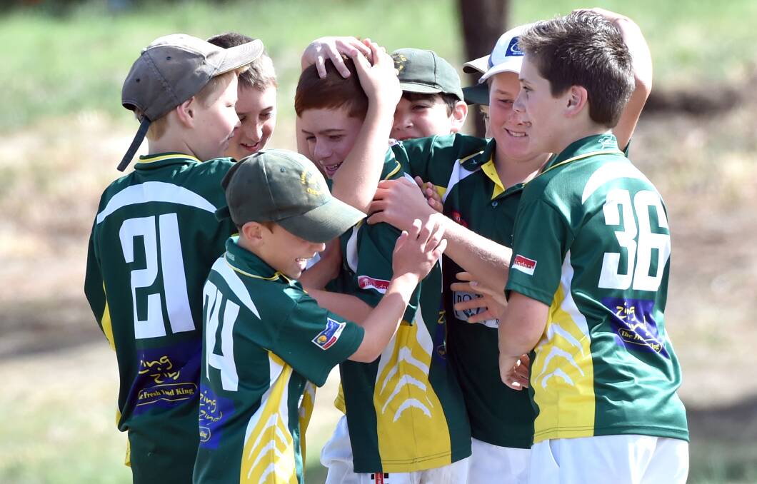 Kangaroo Flat players celebrate a wicket in their under-12A match against Eaglehawk on Saturday. Picture: GLENN DANIELS
