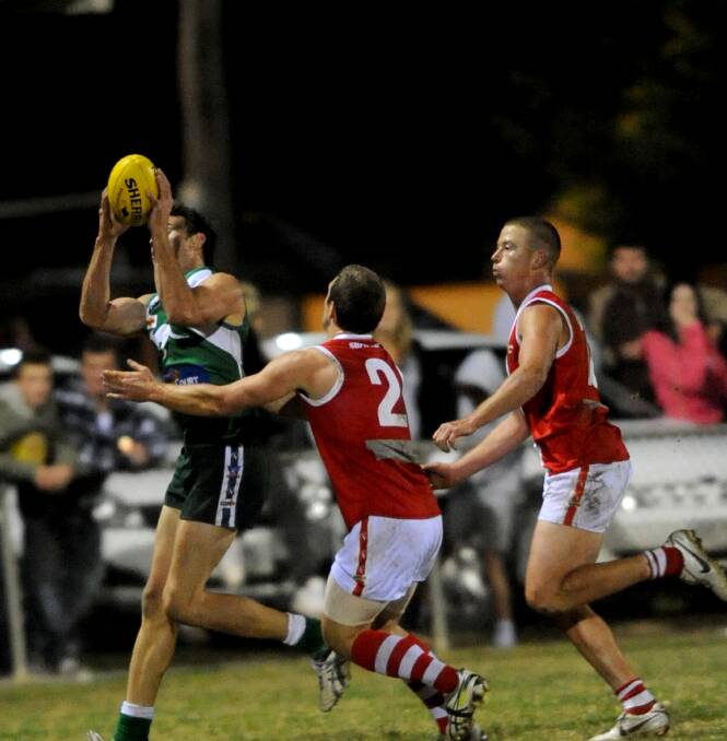 FOCAL POINT: Kangaroo Flat's Justin Maddern takes a mark during his 10-goal performance against South Bendigo in round three of 2011. The Roos kicked a score of 130, yet still lost by 30 points at Dower Park.