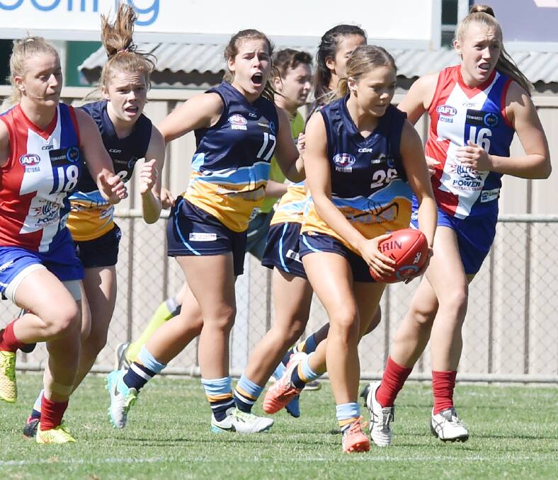 ON THE BURST: Charli Edlin gets ready to boot the Bendigo Pioneers forward in their TAC Cup girls match on Friday at Golden Square.