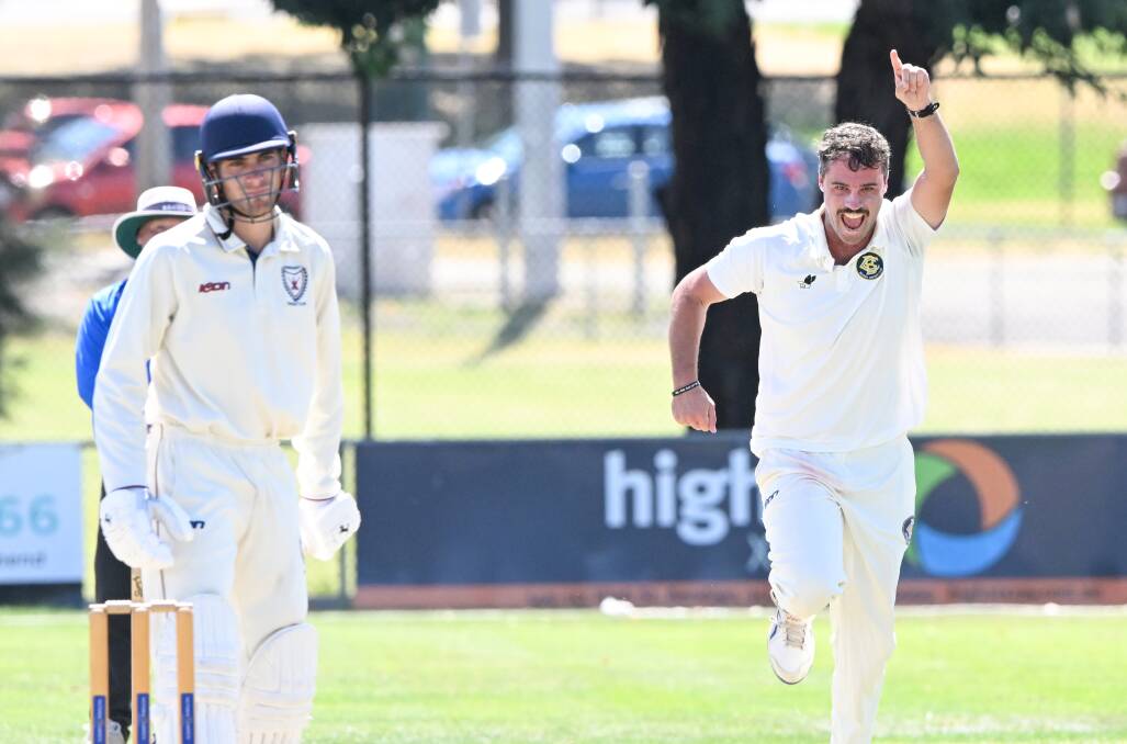 Bendigo's Nathan Fitzpatrick celebrates one of his 11 wickets for the match against Sandhurst at Atkins Street on Saturday. Picture by Darren Howe