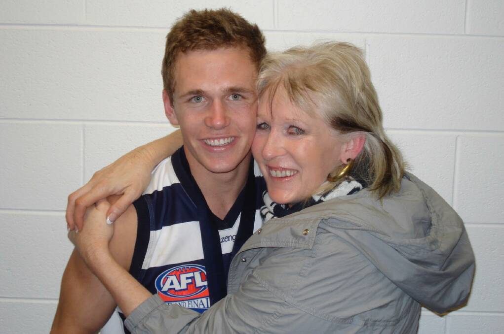 PREMIERSHIP SMILES: Joel and Maree Selwood celebrate Geelong's grand final win over Port Adelaide in 2007. Joel has added another two flags since in 2009 and 2011.