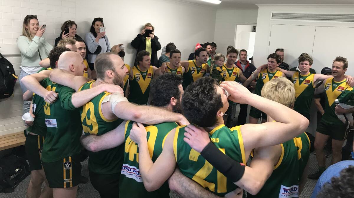 IN-FORM: Colbinabbin players sing the song after their 26-point second semi-final win over North Bendigo at Heathcote a fortnight ago.