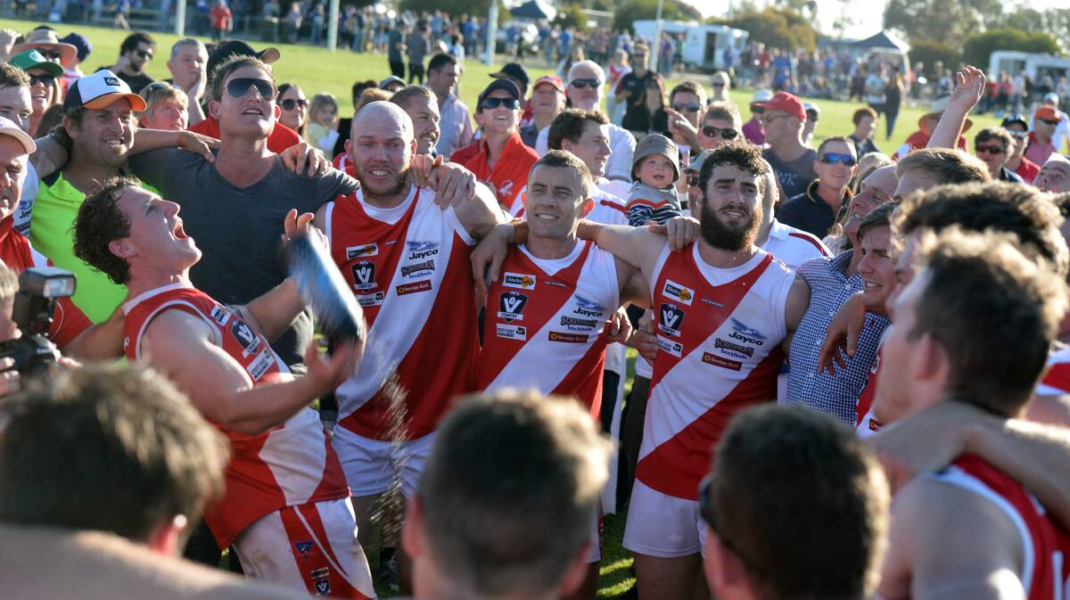 HARD WORK PAYS OFF: Bridgewater players celebrate after beating Bears Lagoon-Serpentine by 96 points in the 2014 LVFNL grand final played at Mitiamo.