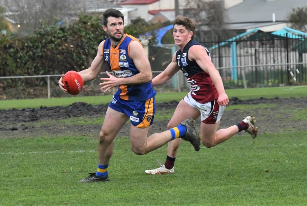 Golden Square's Jon Coe and Sandhurst's Sam Conforti. The Bulldogs and Dragons meet in the BFNL second semi-final at the QEO on Saturday. Picture by Adam Bourke