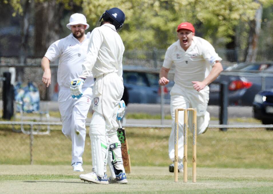 WICKET: Bendigo United's Connor Thomson and Leigh McDermott are up and about after the dismissal of Sandhurst's Nahid Hossain on Saturday. Picture: DARREN HOWE