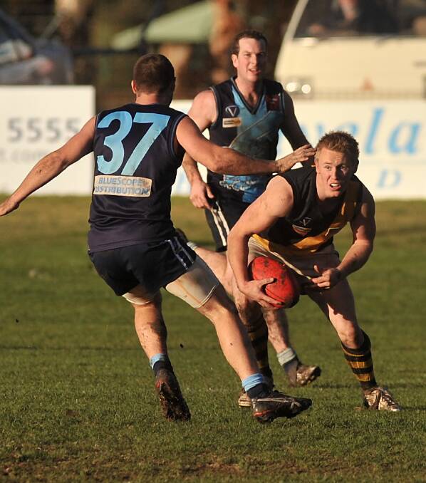 HAWKS HIT BACK: Action from Eaglehawk's 208-point win over Kyneton in round 12, 2009, at Canterbury Park. When they met earlier in the season, Kyneton won by eight points in what was the Tigers' only victory that year.