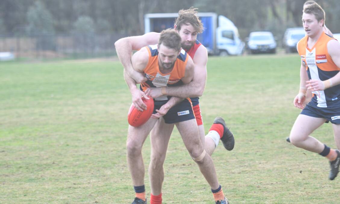 DOWN TO THE WIRE: Action from last week's Maiden Gully YCW v Calivil United game won by the Eagles by four points. However, the Eagles exceeded their player points cap of 45. Picture: ANTHONY PINDA