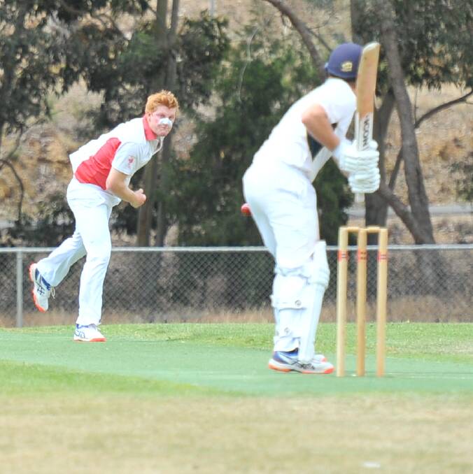 BIG WICKET: Mandurang's Jeremy Hancock bowls the ball that dismissed Spring Gully's Rhys Webb for a duck on Saturday. Picture: LUKE WEST