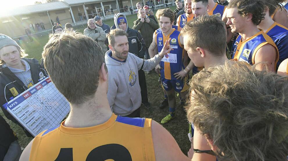 PARTING WAYS: Bernie Haberman addresses his players during one of his 59 games as coach of Golden Square. The Bulldogs will have a new coach in 2021. Picture: NONI HYETT