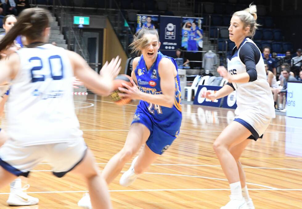 ON THE ATTACK: Bendigo's Tessa Lavey drives to the basket in the first quarter of Thursday night's 99-81 win over Frankston at the Bendigo Stadium. Lavey finished with 22 points and six rebounds. Picture: LUKE WEST