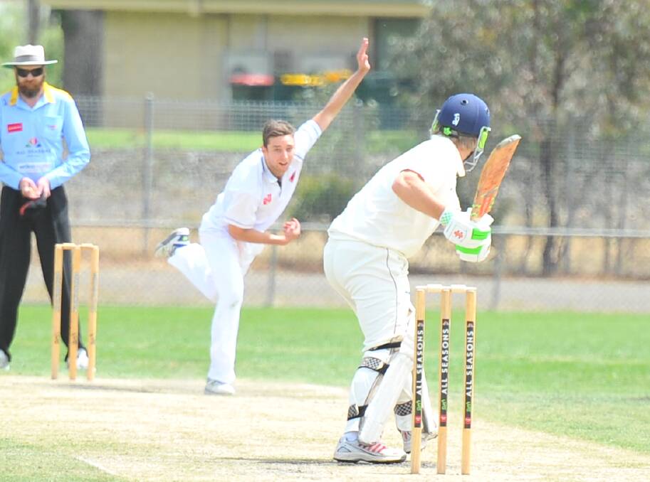 ON THE SPOT: White Hills' Rhys Irwin bowls to Sandhurst's Ben Leed on Saturday. Irwin took four wickets for the Demons. Pictures: LUKE WEST