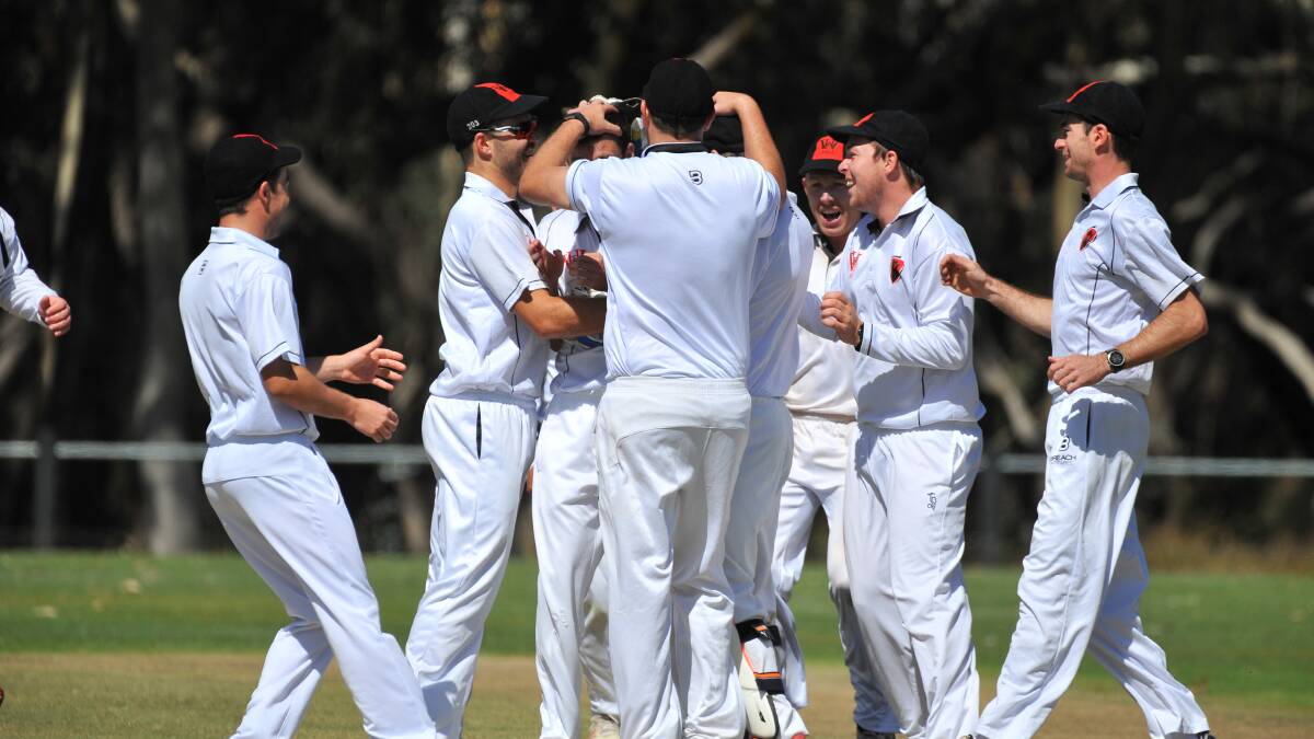 WHAT A START: White Hills celebrate one of their three early semi-final wickets against Strathdale-Maristians.