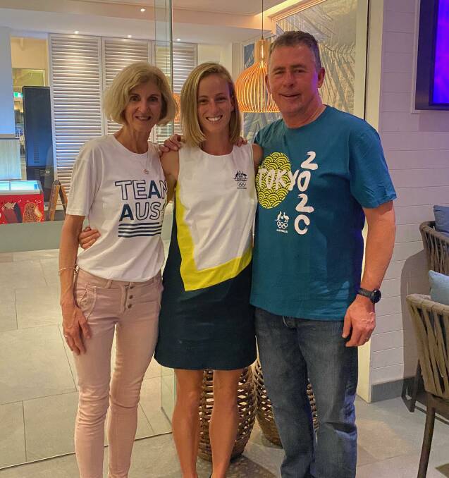 PROUD PARENTS: Pauline and Brendan O'Kane with daughter and marathon runner Ellie Pashley in her Olympic Games opening ceremony uniform. Picture: CONTRIBUTED