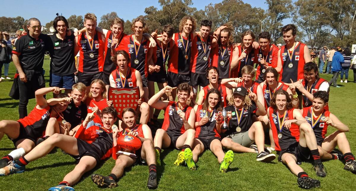 DEMON DELIGHT: White Hills players after winning Saturday's under-17 grand final against Mount Pleasant by 12 points at Huntly. It was the Demons' first under-17 flag since 2000. Picture: ADAM BOURKE