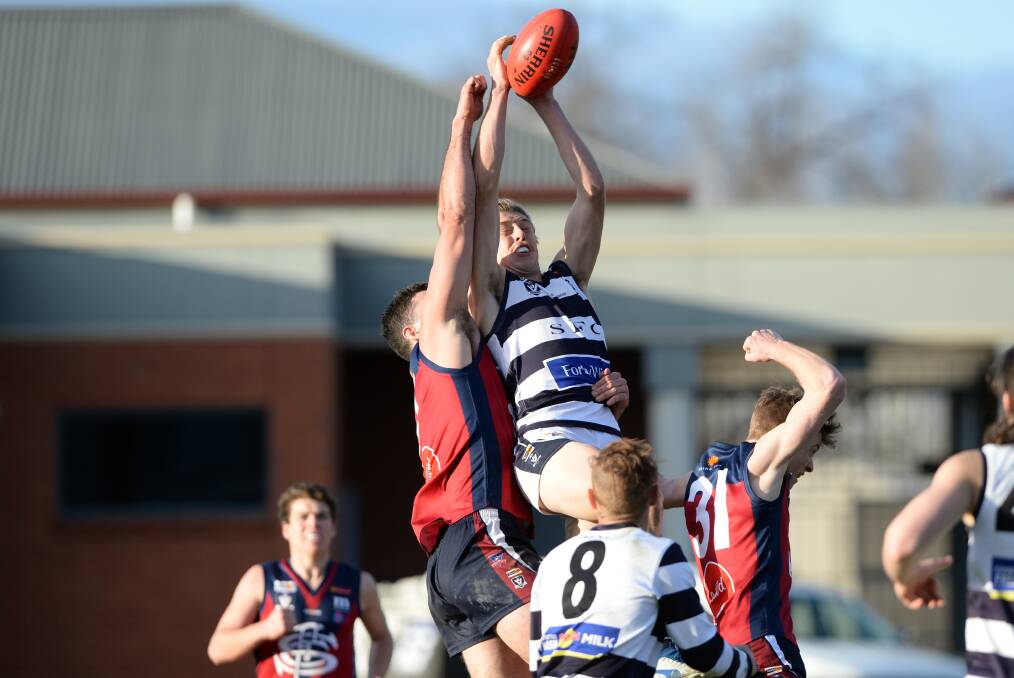LEAP: Strathfieldsaye's Harry Conway flies for a mark during Saturday's 15-point victory over Sandhurst at the QEO. Conway kicked two goals. Picture: GLENN DANIELS