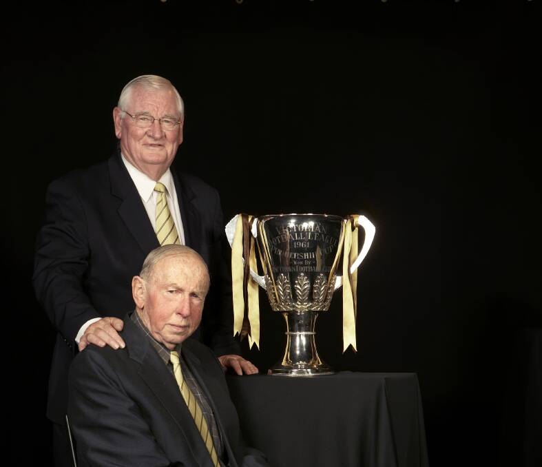 FLAG SUCCESS: Graham Arthur and John Kennedy Sr. with Hawthorn's 1961 premiership cup. Kennedy was coach and Arthur the captain. Pictures: HAWTHORN FOOTBALL CLUB