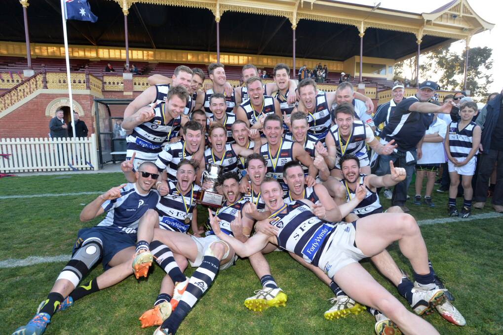 PREMIERS: The Strathfieldsaye team that defeated Sandhurst to capture the club's first senior premiership in 2014. It took the Storm just 114 games to win its first flag.