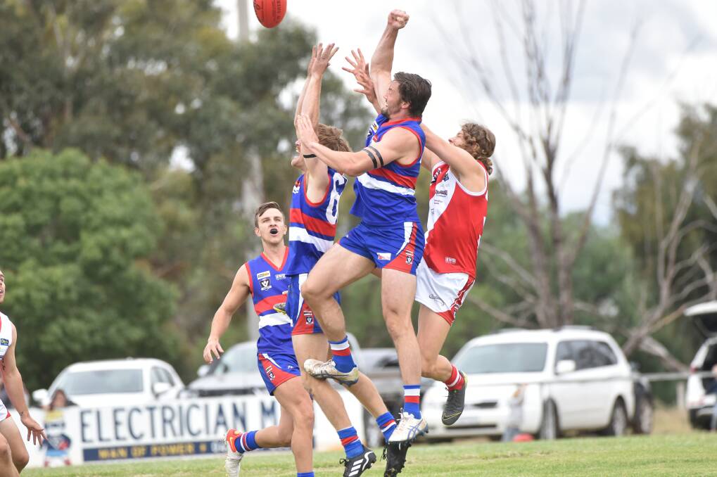 The pack flies in Saturday's Bridgewater v Pyramid Hill game. Picture: NONI HYETT