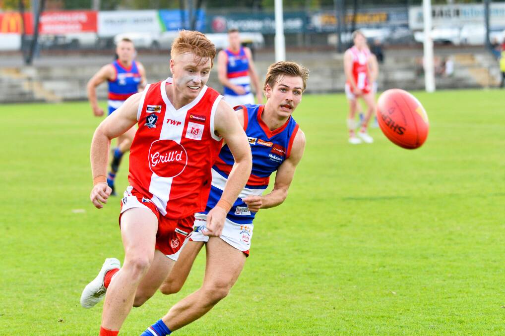 DETERMINED: South Bendigo's Will Keck leads the race for the ball in Saturday's win over Gisborne at the QEO. Picture: BRENDAN McCARTHY