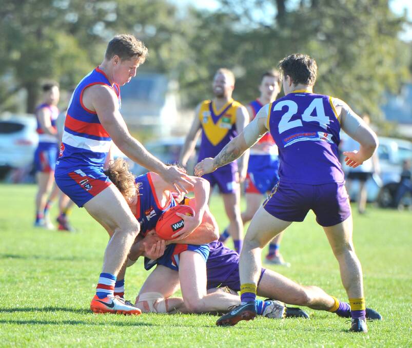 CONTESTED BALL: Action from Saturday's preliminary final between Pyramid Hill and Bears Lagoon-Serpentine.
