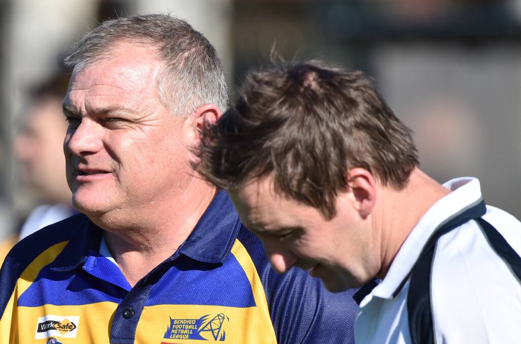IN CHARGE: Outer East coach Nick Rutley speaks with Bendigo's Darryl Wilson pre-game. Picture: GLENN DANIELS