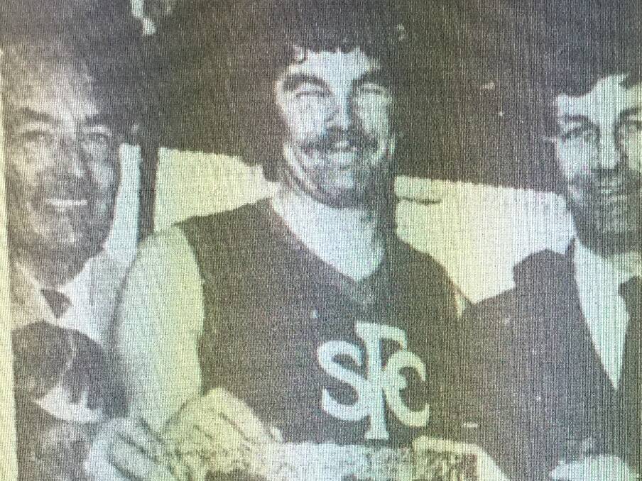 SMILES: Sandhurst committeeman Jack Clayton, coach Ron Best and president Larry Williams after the 1973 grand final triumph over Golden Square by 46 points.