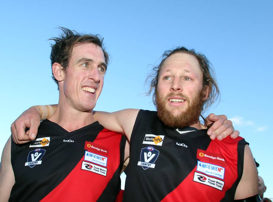 JOB WELL DONE: Ryan Prendergast and Hoby Bussey are both now two-time Bombers premiership players.