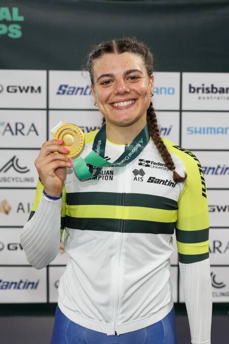 Alessia McCaig with her gold medal after winning the elite women's Keirin final in Brisbane on Friday night. Picture by Mackenzie Sweetnam