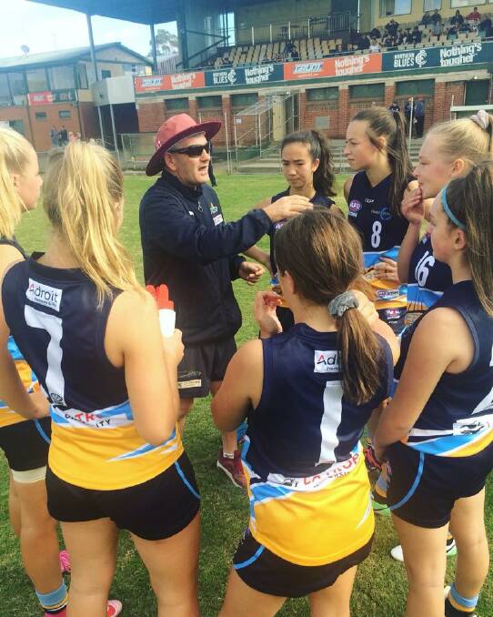 INSTRUCTIONS: Bendigo Pioneers Girls coach Shawn McCormick addresses his players at Preston City Oval on Sunday. Picture: BENDIGO PIONEERS FACEBOOK PAGE