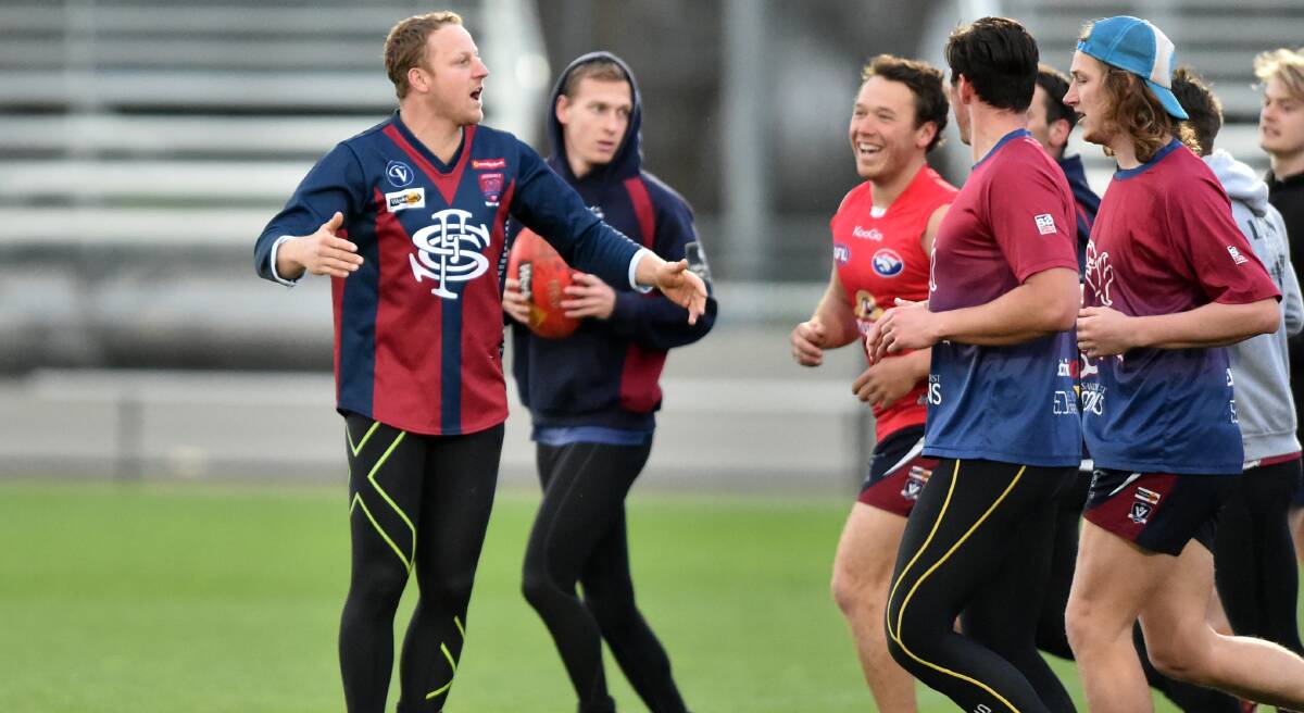 ROUNDING UP THE TROOPS: Sandhurst captain Blair Holmes leads his players at training ahead of the grand final on Thursday night at the QEO. Picture: GLENN DANIELS