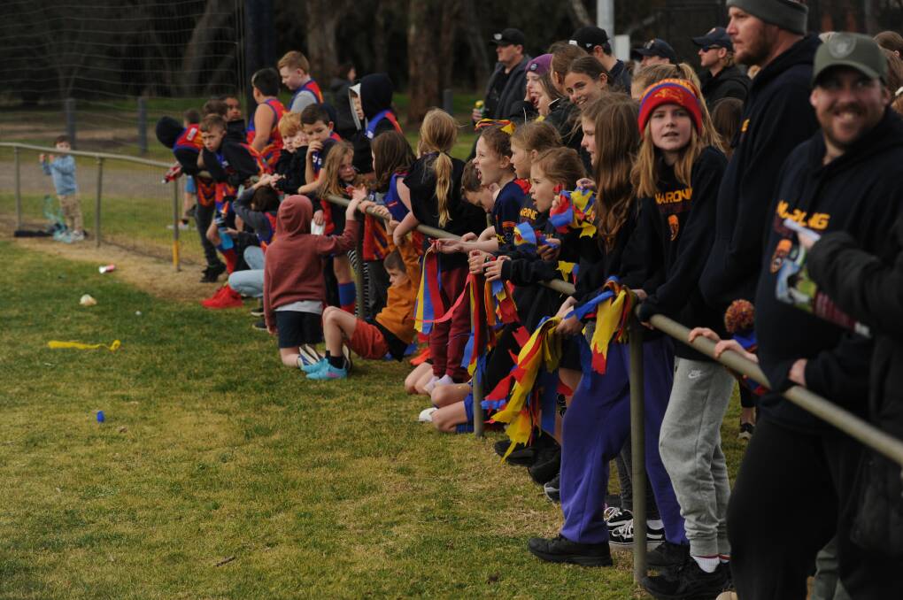 Young Marong supporters wait for Brandyn Grenfell to kick goal 100 on Saturday. Picture: ANTHONY PINDA