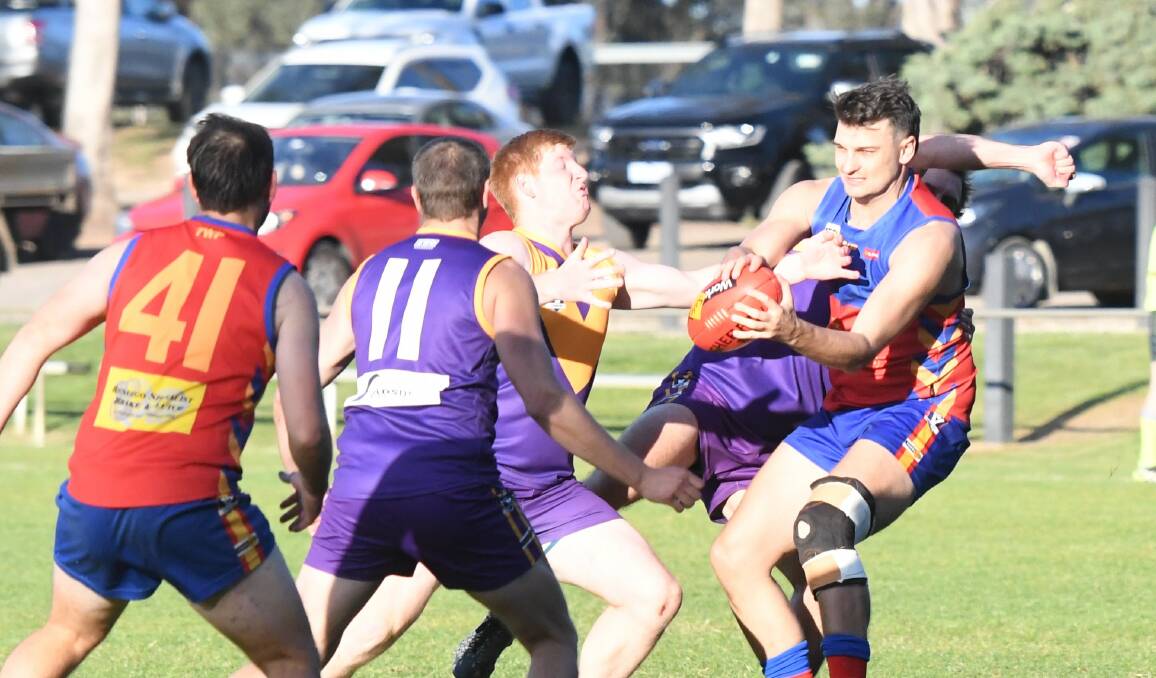 STRONG HANDS: Marong's Brandyn Grenfell takes a contested mark early in the third quarter against Bears Lagoon-Serpentine on Saturday. Picture: LUKE WEST
