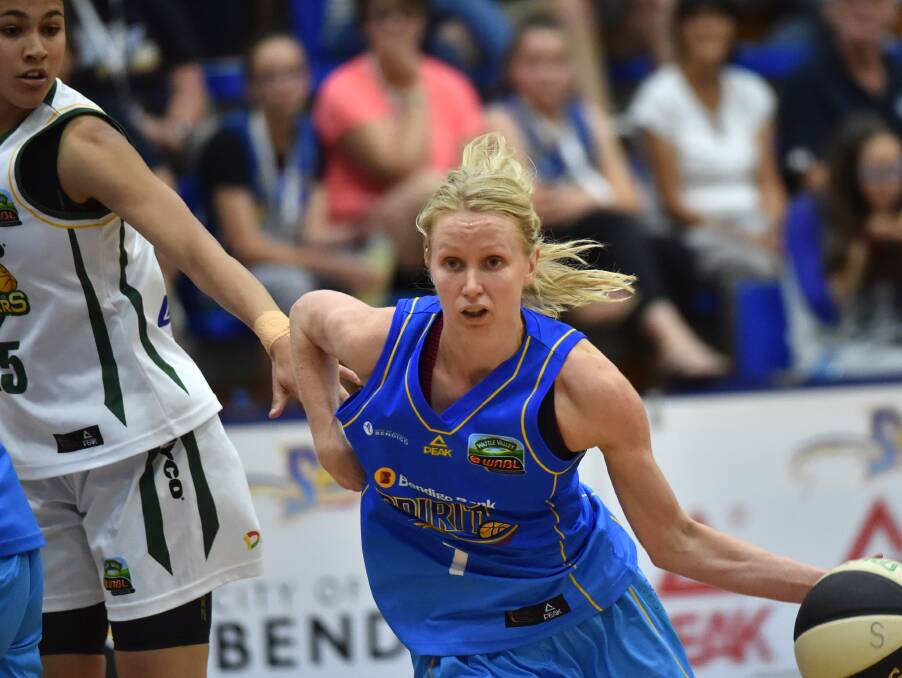 AGGRESSIVE: Heather Oliver scored seven points and hauled down eight rebounds against Dandenong.