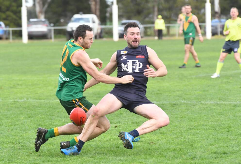 BATTLE OF EXPERIENCE: Colbinabbin's Matt Riordan and Mount Pleasant's Travis Baird compete on Saturday in the qualifying final. Picture: ANTHONY PINDA