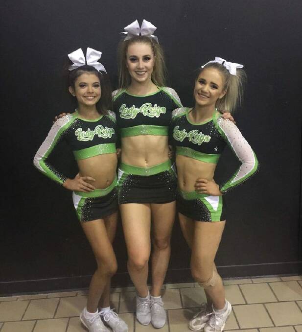 TAKING ON THE WORLD'S BEST: Bendigo trio Arizona Davies, Maddy Theobald and Ashlee Richmond were part of the Southern Cross Cheerleading team that competed at the World Championships in Florida. Picture: CONTRIBUTED