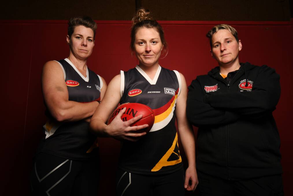 GAME FACES ON: Bendigo Thunder vice-captain Jac Louttit, skipper Leah French and coach Cherie O'Neill. Having won senior flags in 2012 and 2013, the Thunder has a chance to add another on Sunday. Picture: DARREN HOWE