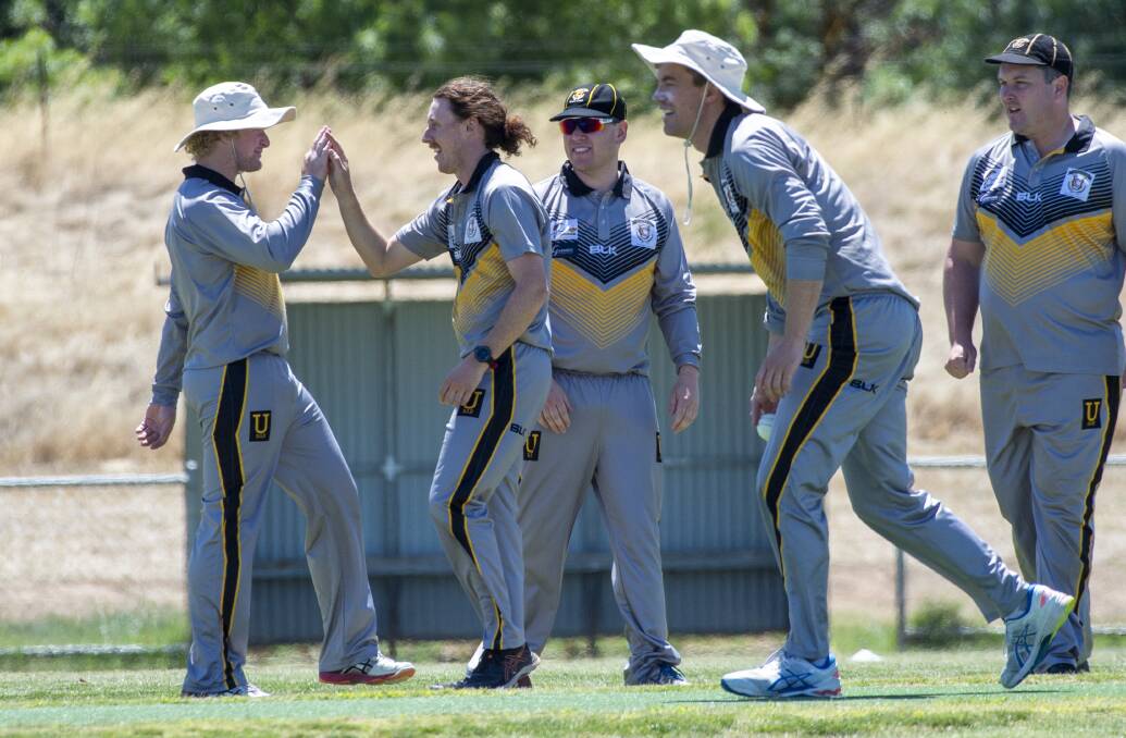 UP AND ABOUT: United celebrates a wicket in its Twenty20 grand final win over Spring Gully.