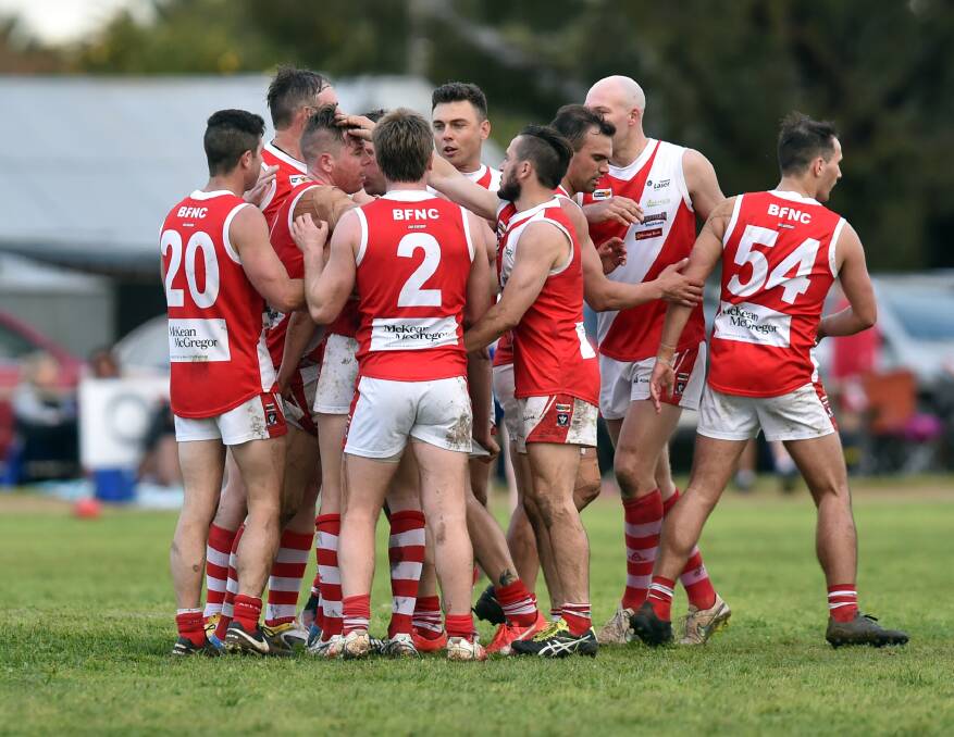 GRAND DAY: Bridgewater players celebrate one of their 19 goals in their 50-point 2016 grand final win over Mitiamo at Pyramid Hill. Pictures: GLENN DANIELS