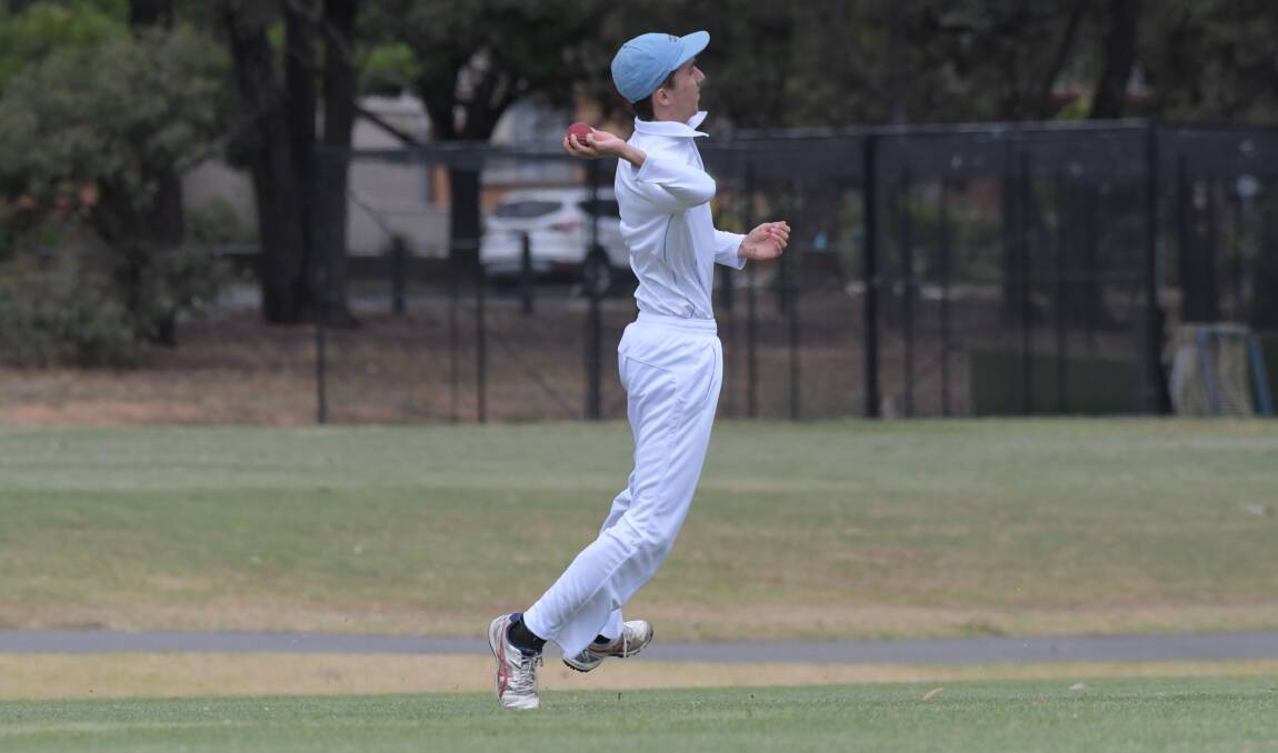 WELL FIELDED: Strathdale-Maristians' James Vlaeminck fires the ball back in on Saturday at Bell Oval.