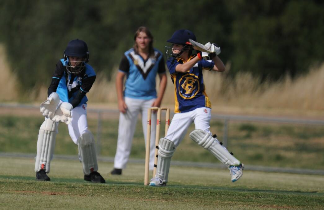 NICE SHOT: Bendigo's Lachie Nicholson cuts the ball during Saturday's BDCA under-16A game against Huntly-North Bendigo at Epsom-Huntly Recreation Reserve. The Power proved too strong for the Goers, winning by eight wickets. Pictures: LUKE WEST