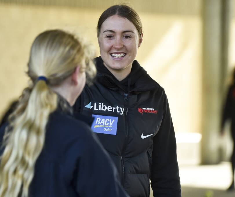ALL SMILES: Australian pace bowler and Melbourne Renegade Tayla Vlaeminck back at her former school Catherine McAuley College on Thursday.