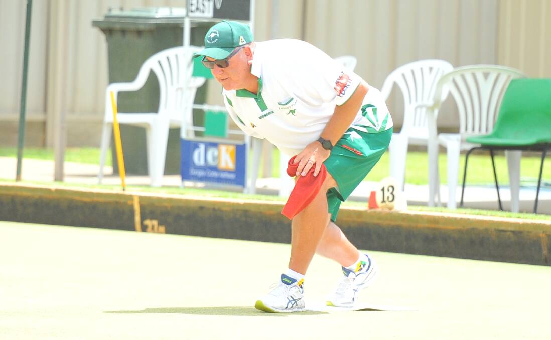 THRILLER: Kangaroo Flat skipper Paul Moller bowls on Saturday. Moller's rink picked up six shots on its last two ends to lift the Flat over Bendigo East by one. Picture: LUKE WEST
