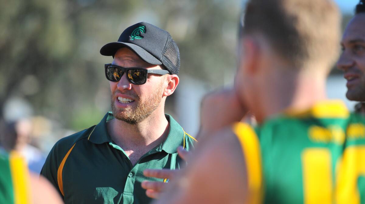 IN CHARGE: Colbinabbin coach Julian Bull at quarter-time of Saturday's win over Mount Pleasant. The Grasshoppers improved to 6-1 with their victory.
